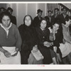 Mexican pecan workers waiting in union hall for assignment to work. San Antonio, Texas