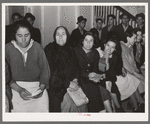 Mexican pecan workers waiting in union hall for assignment to work. San Antonio, Texas