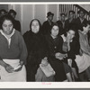 Mexican pecan workers waiting in union hall for assignment to work. San Antonio, Texas