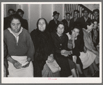 Mexican pecan workers waiting in union hall for assignment to work. San Antonio, Texas