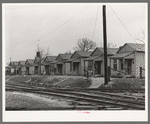 Row of houses along the railroad track. Mexican quarter, San Antonio, Texas