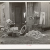 Clothing and personal belongings outside of house in Mexican quarter. San Antonio, Texas