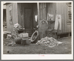 Clothing and personal belongings outside of house in Mexican quarter. San Antonio, Texas