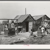 House and yard of Mexican family. San Antonio, Texas