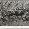 Detail of disk plow breaking virgin sod. El Indio, Texas