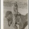 Cowboy on horseback near Eagle Pass, Texas