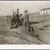 Building lateral irrigation ditch. El Indio, Texas