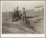 Building lateral irrigation ditch. El Indio, Texas