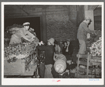 Activity in the early morning vegetable market. San Antonio, Texas