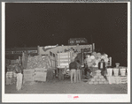 Vegetable trucks in lineup at open air market. San Antonio, Texas