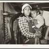 Mexican mother and child in shack home. San Antonio, Texas
