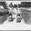 Little girls with their dolls and buggies, Caldwell, Idaho