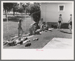 Sun bathers at the swimming pool, Caldwell, Idaho