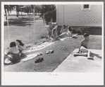 Sun bathers at the swimming pool, Caldwell, Idaho