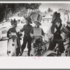 Bicycle riders in parade on the Fourth of July at Vale, Oregon