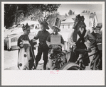 Bicycle riders in parade on the Fourth of July at Vale, Oregon