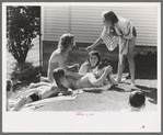 Sun bathers at the park swimming pool, Caldwell, Idaho