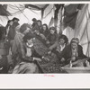 Repickers who pick over the hops after original picking by portable-type mechanical picker, Yakima Chief Hop Ranch, Yakima County, Washington