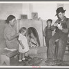 The Lopez home is many generations old, and this fireplace has been the only form of heating its inhabitants have known, Trampas, New Mexico
