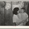 Mother and child, relief clients near Jefferson, Texas. The mother has had pellagra in advanced state but has had some treatment. The child has rickets. Has never talked though two years old. The child has never been taken to a doctor