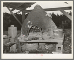 Oven of Italian strawberry grower near Independence, Louisiana. The Italians in this section all have these outdoor ovens and bake all their bread in them