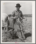 Tenant farmer on thirds and fourths near Marshall, Texas