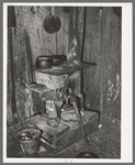 Stove on block in home of Negro family living near Jefferson, Texas