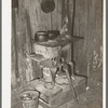 Stove on block in home of Negro family living near Jefferson, Texas