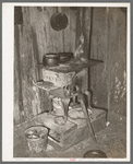 Stove on block in home of Negro family living near Jefferson, Texas