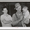 Wife and husband and child. Note condition of woman's teeth. Living on outskirts of Jefferson, Texas