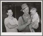 Wife and husband and child. Note condition of woman's teeth. Living on outskirts of Jefferson, Texas
