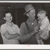 Wife and husband and child. Note condition of woman's teeth. Living on outskirts of Jefferson, Texas
