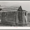 Log shed and privy near Jefferson, Texas