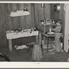 Interior of temporary home of white migrant strawberry pickers near Ponchatoula, Louisiana