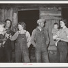 Two young couples with their children. These are migratory berry pickers near Ponchatoula, Louisiana