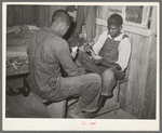 Game of "coon-can" played by group of Negroes in bunkhouse of strawberry pickers near Hammond, Louisiana