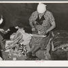 White migrant woman finishing an ornament made of horns. They depend upon the sale of these ornaments for a living. Hammond, Louisiana