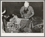 White migrant woman finishing an ornament made of horns. They depend upon the sale of these ornaments for a living. Hammond, Louisiana