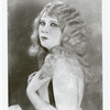Publicity photograph of Mae West with long hair