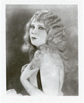 Publicity photograph of Mae West with long hair