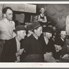 Spectators at cattle auction. San Augustine, Texas