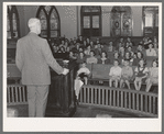 Minister preaching to his congregation. San Augustine, Texas