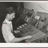 Setting type by hand. Newspaper office. San Augustine, Texas