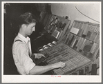 Setting type by hand. Newspaper office. San Augustine, Texas