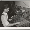 Setting type by hand. Newspaper office. San Augustine, Texas