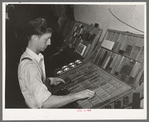 Setting type by hand. Newspaper office. San Augustine, Texas