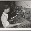 Setting type by hand. Newspaper office. San Augustine, Texas