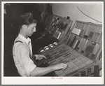 Setting type by hand. Newspaper office. San Augustine, Texas