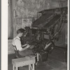 Linotype operator. Newspaper office. San Augustine, Texas