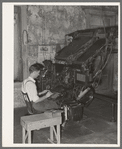 Linotype operator. Newspaper office. San Augustine, Texas